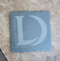 Leakey designs slate coaster