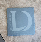 Leakey designs slate coaster