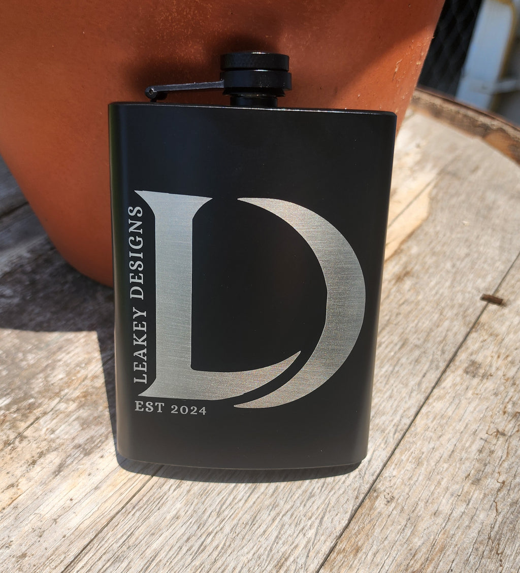 Engraved hip flask