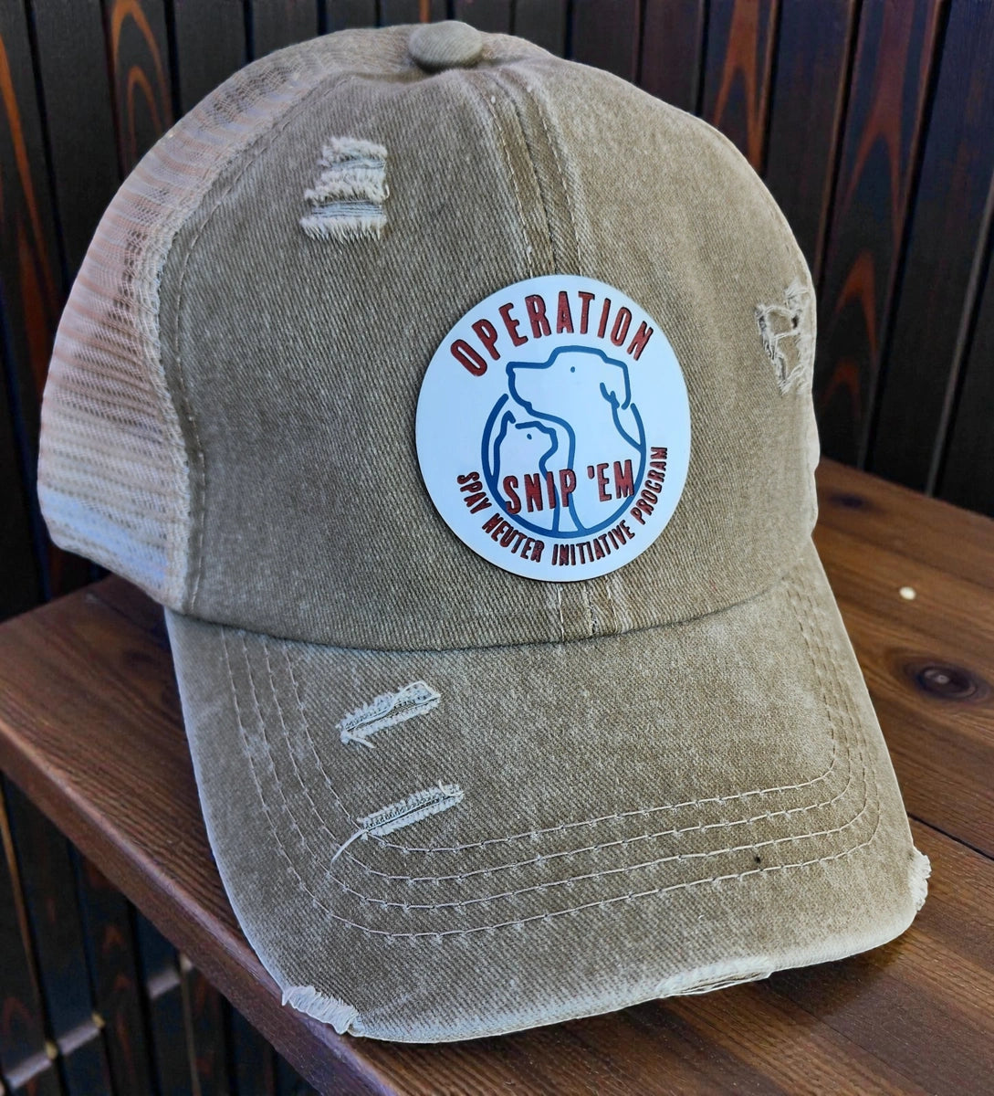 Distressed hat with "Operation Snip 'em" patch